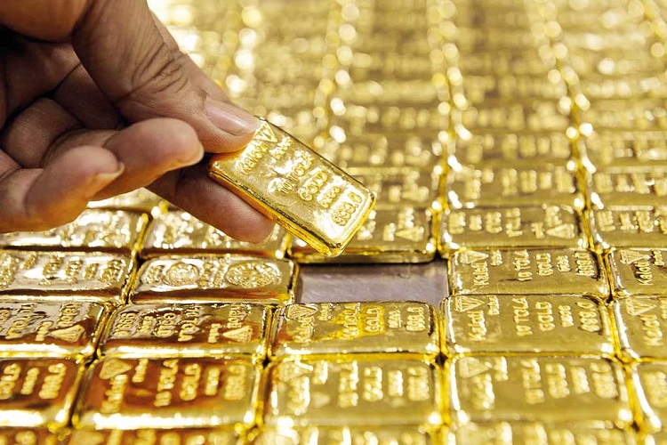 Gold has surged due to the pandemic — and it could keep going. Here’s what to know about investing now